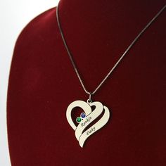 Our Two Hearts Forever One Necklace features beautiful birthstones and personalized engravings of each person. Meticulously handcrafted from .925 Sterling Silver and your choice of plating option: 18K Gold. An excellent gift choice for the one you love. Customized Stainless Steel Heart Pendant Jewelry, Personalized Heart Pendant Birthstone Necklace As A Gift, Personalized Stainless Steel Heart Pendant Jewelry, Personalized Stainless Steel Heart Pendant, Personalized White Gold Heart Necklace For Anniversary, Personalized White Gold Heart Necklace Anniversary Gift, Stainless Steel Jewelry With Hallmark For Anniversary, Customizable Heart Pendant Necklace For Anniversary, Stainless Steel Jewelry Hallmarked For Anniversary