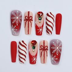 Celebrate the warmth and wonder of the season with our Christmas 2024 Handmade Press-On Nails! ✨🎄Each set is lovingly crafted with exclusive festive designs, bringing the sparkle and joy of the season right to your fingertips. Imagine your nails dazzling at holiday parties, glowing by the fire during cozy nights, or becoming the perfect gift that lights up someone’s day. 🎁💅 These nails are more than an accessory—they’re a piece of the holiday spirit. All nails are made to order Come in all sh Red And White Christmas Acrylic Nails, Red Sparkly Nails, Lily Nails, Holiday Snowflakes, Acrylic Press On Nails, Coffin Press On Nails, Nail Art Set, Snowflake Nails