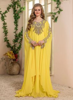 100% Handmade Contains: Inner & Kaftan Care: Dry Clean Only Shipping: Worldwide 8 - 10 Working Days. depends your location. => In order to make it more suitable for you. please tell me your garment measurements : -- Your Height:- -- Dress Height (Shoulder to toe):- -- Your Bust circumference:- -- Dress Bust circumference:- -- Phone number for shipping:- => If you have some specific request or special character, such as broad shoulder, long arms, long waist etc ,please let us know.I can make any size for you. => DRESS/GARMENT MEASUREMENTS (NOT BODY SIZE): => Waist Size & Hip Size may vary depends on the garment pattern. Size: XS (US 2 | UK 4) Bust: 33 inch Waist: 27 inch Hips: 35 Inch Size: S (US 4 | UK 6) Bust: 35 inch Waist: 29 inch Hips: 37 Inch Size: M (US 6 | UK 8) Bust: 37 inch Waist: Luxury Yellow Kaftan With Dabka Work, Luxury Yellow V-neck Kaftan, Luxury Yellow Floor-length Kaftan, Long Chiffon Evening Dress, Farasha Abaya, Islamic Wear, Arabic Fashion, Arabic Wedding Dresses, Muslim Dresses