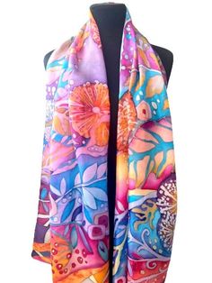 Made to order. The scarf is made of high quality Italian silk. Sewn by hand. Kaleidoscope of bright colors will warm you up in winter and refresh you on a hot summer day. Decorative and abstract pattern of leaves and herbs can be viewed for a long time. The color scheme consists of shades of amethyst, aquamarine, rose, lily, copper, yellow gold. All colors harmoniously combine and create a joyful mood. The size of the scarf is 180cm / 45cm, 71" / 17". Handmade scarf is a wonderful gift for all bright and extraordinary women. To feel the touch of natural silk on your body is a great luxury and pleasure! Care instructions: Wash natural silk products, painted in batik technique, carefully, without pre-soaking, in cool water (30-40 C) with the addition of liquid soap or shampoo. After rinsing, Handmade Scarf, Rose Lily, Silk Scarf Painting, Extraordinary Women, Hand Painted Silk Scarf, Handmade Scarves, Painted Silk, Hand Painted Silk, Natural Silk