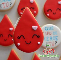 red and white decorated cookies with hearts in the shape of tears are displayed next to each other