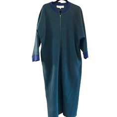 Vintage 1980s Christian Dior Blue Green Long-Sleeve Zip-Up Fleece Robe Medium Elevate your wardrobe with this Christian Dior fleece robe. The long sleeves and zip-up design offer comfort and style for cooler days.  A great vintage piece from the past, this retro robe will keep you warm and stylish in the colder weather.  The item has been laundered according to garment specifications. * Long sleeves * Full zip-up closure * Medium size * Fleece material * Contrasting collar and cuffs * Ankle length Content: unable to see due to wear on tag Measurements: Armpit to armpit: 25" Back of collar to bottom hem: 51" We ship most items out the next business day.  Please contact us with any additional questions.  We are happy to combine shipping when possible. Thank you! 2378 Features: * Robe Size: W Fleece Robe, Pajama Robe, Womens Robes, Collar And Cuff, Zip Up, Medium Size, Cold Weather, Christian Dior, Zip Ups