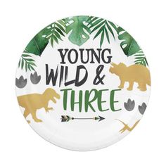 a paper plate with the words young, wild and three on it's side