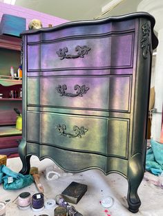 Tanglewood Works Hand Painted Furniture Moody Maximalist Colorshift Dresser Whimsical Painted Dresser, Ideas For Painting Furniture, Bulky Nightstand Makeover, Unicorn Spit Dresser, Dark Painted Dresser, Rainbow Maximalist Decor, Whimsigoth Furniture, Repurposing Dressers, Current Furniture Trends