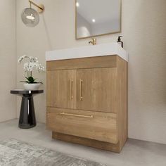 a bathroom with a sink, mirror and wooden cabinet in the corner next to a rug