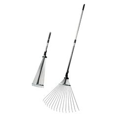 two metal rakes with black handles on white background