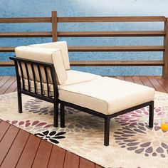 a white chair sitting on top of a wooden deck