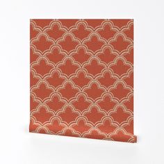 an orange and white wallpaper with scallop pattern on the front, against a white background