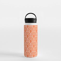 an orange and white water bottle with a black lid that has wavy lines on it