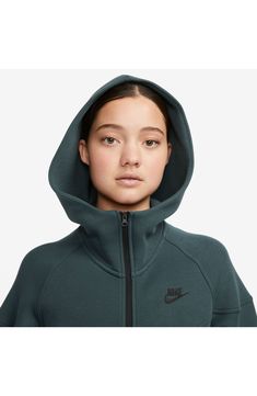 Stay cozy and warm without the extra bulk in a full-zip hoodie made from lightweight tech fleece and finished with convenient zippered pockets. 25" front length; 27" back length (size medium) Front zip closure Fixed hood Front zip pockets 53% cotton, 47% polyester Machine wash, tumble dry Imported Deep Jungle, Nike Sportswear Tech Fleece, Tech Fleece, Stay Cozy, Full Zip Hoodie, Nike Sportswear, Zip Hoodie, Zip Pockets, Nordstrom