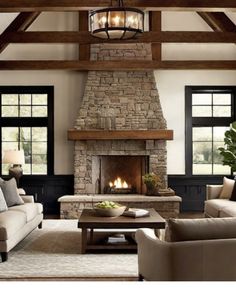 a living room filled with furniture and a fire place