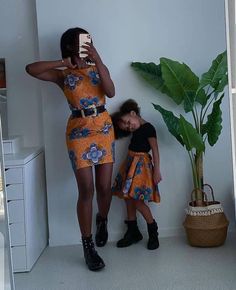 This is an African Print Mom and Daughter Matching Outfit for photo-shoot and other social event. Features: * Brand New 100% cotton fabric of highest grade/quality. * Carefully lined for perfect fit. * Professionally sewn and finished. Before ordering, kindly go through the available fabrics and size chart to make your choice. If you wish to provide your measurements for more perfect fit, kindly send the following: * Bust * Waist * Hip For your daughter, please send her size or measurement to me Sleeveless Cotton Dresses With Matching Set, Fitted Cotton Dresses With Matching Set, Fitted Orange Cotton Dress, Dress For Mom And Daughter, Photoshoot African, Ankara Print Dress, Dress For Mom, Mom And Daughter Matching, Mom And Me