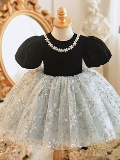 This elegant Princess Round Tea Length Lace Flower Girl Dress in Black is perfect for any special occasion, including baptisms, birthdays, holidays, and more. Made with luxurious lace and velvet fabrics, the dress features a beautiful round neckline, short puff sleeves, and a back zip closure for a perfect fit. Its tea length silhouette is embellished with delicate lace detailing, making your princess stand out in style. 2023 Ball Gown, Flower Sequins, Christmas Princess, Toddler Princess Dress, Lace Flower Girl Dress, Crinoline Skirt, Baby Girl Princess Dresses, Puffy Dresses