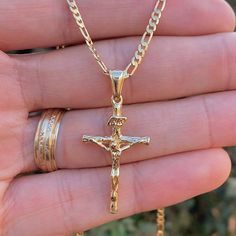 Embrace Timeless Style And Faith With Our Rustic Cross Necklace, Featuring A Uniquely Crafted Cross With A Diamond Cut Design That Adds A Touch Of Brilliance To Its Rugged Charm. Paired With A Classic Valentino Chain, This Necklace Is Both Versatile And Elegant, Making It A Perfect Accessory For Both Men Product Details Material: 14k Gold Filled Metal Purity: 14k Chain Size: 24" Inches Chain Thickness: 2.3mm Pendant Size: 33x18mm Chain Style: Figaro Link Gender: Male Clasp Type: Lobster Claw Age Men’s Crucifix Necklace, Jewelry Men Gold, Mens Gold Cross Necklace, Gold Cross Chain For Men, Necklace Men’s Gold, Gold Mens Jewelry, Jewelry Men Aesthetic, Cross Chain Men, Men’s Jewelry