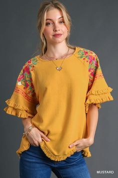 Umgee Linen blend top with layered flounce sleeves and embroidery. Fringe hemmed. Super cute blouse! Color: Mustard Sizes: S-M-L True to sizeOur model is 5' 9" wearing a small 55% Linen, 45% Cotton, importedO5/K7342 Umgee Clothing, Tiered Sleeve, Umgee Tops, Embroidered Linen, Cute Blouses, Style Tops, Flounce Sleeve, Ruffled Sleeve Top, Long Puff Sleeves