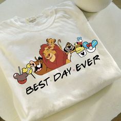 a white t - shirt with the words best day ever printed in front of it