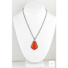 Stand out in this beautiful eye-catching burnt orange resin, hematite and cubic zirconia necklace. Bold and bright it is ready for your next event and bound to get you noticed! The beautiful uniquely shaped burnt orange resin bezel has shimmering ribbons of saffron yellow throughout and it is framed by sparkling cubic zirconia stones.Stunning, bright and shimmering faceted cherry burnt orange resin framed by black gold-plated sterling silver bezel that is studded with sparkling cubic zirconia. Black gold-plated short and long oval link chain. Beautiful shimmering silvery black hematite beads wrapped in black gold-plated chain. Gunmetal-plated brass lobster clasp for a secure and comfortable fit. 18.5 inches long. Only one available! Make this gorgeous limited edition necklace yours today! Long Orange Necklace For Gift, Orange Long Necklace For Gift, Elegant Long Orange Necklace, Orange Long Necklace For Gifts, Orange Long Necklace Gift, Orange Necklace With Large Pendant For Gift, Elegant Orange Pendant Necklaces, Elegant Orange Necklace With Lobster Clasp, Elegant Citrine Orange Necklace