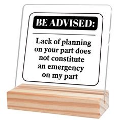 a wooden block with a sign stating that it is not allowed to be involved in an emergency