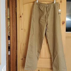 Soul Flower 40% Cotton, 60% Hemp Men's Pants. Color: Sand. Cheap Beige Men's Bottoms, Beige Full-length Bottoms With Pockets, Khaki Relaxed Fit Full-length Pants, Khaki Full-length Pants With Welt Pockets, Relaxed Fit Military Khaki Bottoms, Flower Pants, Mens Pants, Cotton Blend, Man Shop