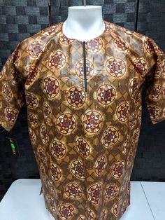 Dashiki with embroidery for men . One size fits all. Please tell us your size in the notes sectionat checkout if you want it altered to a fitting size. Traditional Brown Printed Top, Embroidery For Men, Dashiki For Men, Mens Dress Shirts, African Dashiki, African Men, Mens Dress, Mens Shirt Dress, Dress Shirts