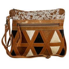 Detail: ﻿Take your valuables and necessities with you in style with this gorgeous bag. Like others in our Dakota Plains collection, the hair-on hide is accented beautifully with warm caramel leather in a criss-cross pattern. Zipper-close top with zippered pockets on both the front and back. Has a matching hand strap and durable shoulder strap that’s removable and fully adjustable. Brown Calf Hair Shoulder Bag With Leather Handles, Brown Calf Hair Satchel Bags, Brown Calf Hair Bag For Daily Use, Brown Calf Hair Shoulder Bag For Daily Use, Brown Calf Hair Satchel Shoulder Bag, Brown Calf Hair Tote Shoulder Bag, Brown Leather Trim Pouch Shoulder Bag, Plain Canvas, Sunday Evening