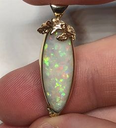 All my Pendants are handmade but this one. Is truly a passion project. This opal came from a very old miner. A beautiful piece of white opal! Stone-Australian Opal Metal-10k Yellow Gold Chain-10k Luxury Gold Opal Necklaces, Luxury Yellow Gold Opal Necklace, Gold Opal Necklace, Gold Opal Spiritual Necklaces, Luxury Opal Pendant Necklace, Luxury Artisan Opal Necklace, Passion Project, Opal Stone, Yellow Gold Chain