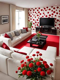 a living room with red and white decor