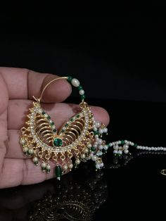 Bridal Nath/ Bollywood Jewelry/ Gold Nath / Kundan Nath/ 100% Handmade Packed in a nice box with cotton lining, Best for gifting to loved ones.. A personal note for your loved ones can be added. *Since this is 100% Handmade jewelry. So Color, shades, texture displayed may slightly vary from the actual product due to digital image limitations. We request you to consider these minor variations. Please expect the possibility of some slight imperfections when buying hand made jewelry. If you have an Nath Bridal, Rose Gold Nose Ring, Nath Nose Ring, Diamond Nose Ring, Indian Nose Ring, Silver Nose Ring, Gold Nose Rings, Bollywood Jewelry, Bridal Jewellery Indian