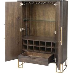 an armoire with glass shelves and drawers in the bottom section, is open to reveal its contents