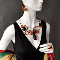 "Avant garde black and orange collar or set by your choice. Unusual artistic playful short necklace, Contemporary necklace, Bohemian jewelry  Very stylish black and orange necklace. This unusual abstract and asymmetric jewelry set is perfect for elegant artistic style or for casual contemporary clothing combinations.  Eye catching, distinct, specific jewelry for those who love to wear unique artistic details. Necklace is short on memory wire, flexible and comfortable and also easy to put on and Unique Orange Necklace For Party, Handmade Orange Necklaces For Party, Black And White Rings, Orange Necklace, Contemporary Necklace, Black And White Theme, Wear Necklaces, Classic Necklace, Contemporary Outfits