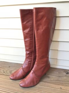 Vintage signature Marc Jacobs zipper boots.  This boots are made with the most soft high quality leather.Gorgeous Vintage Boots that is timeless!  In great vintage condition.  Few small scuffs on bottom heels(see pictures please) but looks great!Classic Sleek/slim line fitColor- BrownUpper and soles leather, black rubber traction soles were added for protection from moisture and better gripSize: 36 1/2, 6.5Width-3”Heels-2” highCalf-12” circumferenceMade in Italy Brown Knee-high Heeled Boots With Zipper Closure, Brown Knee-high Heeled Boots With Zipper, Brown Wide Calf Knee-high Boots With Zipper, Brown Faux Leather Boots With Zipper Closure, Fitted Cognac Leather Boots, Brown Leather Mid-calf Boots With Zipper, Formal Brown Boots With Zipper Closure, Brown Heeled Boots With Leather Lining And Almond Toe, Brown Heeled Boots With Leather Lining And Wide Calf