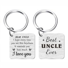 two metal key chains with the words best uncle ever and i love you on them