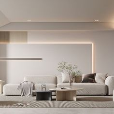 a living room with white couches and tables