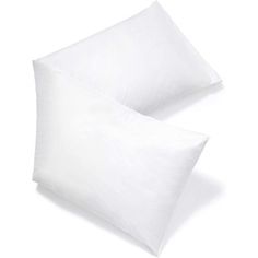 two white pillows sitting next to each other