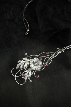 ITEM DESCRIPTION: The length of the circle is 45 cm (18 inches) standard women's size, but you can bend it as needed.  Weight - 35 g.  The open necklace is very light and comfortable. It takes the place of the neck as a chain of 45 cm. I made this botanical open necklace of sterling silver 925 and rhodoliye. But you can order it with other beautiful gems. Such a unique piece on your neck will not go unnoticed at any party or wedding. This handmade necklace will come to you in a gift box - ready for gifting. More poppy jewelry in my shop: https://www.etsy.com/shop/UrsulaJewelry?ref=seller-platform-mcnav&search_query=poppy Nature-inspired Sterling Silver Necklace For Weddings, Nature-inspired Sterling Silver Wedding Necklaces, Nature-inspired Sterling Silver Wedding Necklace, Elegant Silver Hand Forged Necklaces, Collectible Silver Necklace Nature-inspired, Bohemian Sterling Silver Flower Necklace, Poppy Jewelry, Nature-inspired Freeform Silver Necklace, Nature-inspired Sterling Silver Flower Necklace