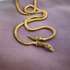 by Anomaly Jewelry Snake Head, Different Meaning, Gold Snake Chain, Nyc Studio, Heads And Tails, Snake Chain Necklace, Snake Necklace, Gold Snake, Snake Chain