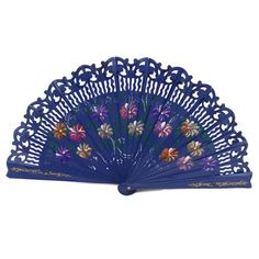 a blue fan with flowers painted on the front and sides, set against a white background