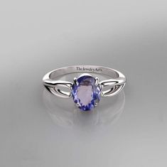 "Most Welcome to \"TheJewelryArts\" Products Description Center Stone: Genuine Tanzanite  Center Stone Size: 6x8mm Stone Shape: Oval Cut Stone Clarity: VVS Material: 92.5 Sterling Silver, also available in 24k Rose Gold Vermeil/Gold Vermeil/Black Vermeil Stamp: 92.5 ➽OCCASION: Surprise your loved one with this beautiful engagement/wedding jewelry by TheJewelryArts . A classic piece of jewelry for all men/women in your life, this is a perfect gift for any occasion such as birthdays, anniversaries, wedding, engagements, Valentine's Day or Christmas day mother's day. ✔Comfort Fit ✔Nickel Free ✔Free Engraving ✔ Free Shipping ✔  Ready to Ship in 3 Business Day Customization is always welcome and please feel free to contact with me if you have any design ideas! If you have any other query please Silver Wedding Ring, Sterling Silver Wedding Rings, Tanzanite Stone, Blue Stone Ring, Jewelry Ring, Silver Wedding, Ring Wedding, Ring Sterling Silver, Ring Jewelry