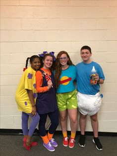 three girls and one boy are dressed up as characters from the spongebob movie