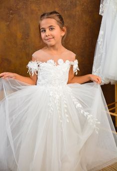 PERFECT FLOWER GIRL DRESS✨ Make order today and SAVE 15%🎁delivery 3-4 days only! Beautiful Baby Flower girl dress with shiny lace and amazing tulle sleeves! Process time: 1-2 working days Delivery time: 2-4 working days  Also offer express overnight delivery https://www.etsy.com/listing/1298332912/express-delivery?click_key=eb8207bd8376c2fa762384c4d5701f79c6bcbc77%3A1298332912&click_sum=63123b47&ga_search_query=express&ref=shop_items_search_1&frs=1 *Train is detachable & all dresses have bow* A First Communion Gown With Tulle Skirt, Confirmation Tulle Ball Gown, Tulle Ball Gown For Confirmation, Tulle First Communion Dress Ball Gown, First Communion Princess Lace Pageant Dress, Confirmation Princess Dress With Tulle Skirt, Lace Princess Dress For Confirmation, Wedding Tutu Dress With Lace Bodice, Confirmation Princess Dress Ball Gown With Tulle Skirt