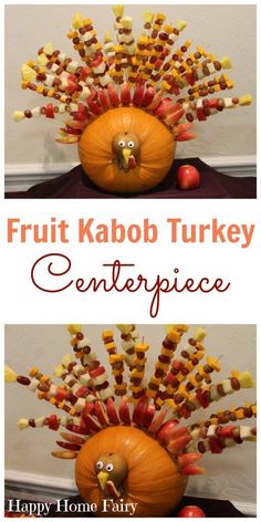 a turkey made out of pumpkins and candy sticks with the words, fruit kabob turkey centerpiece