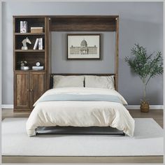 a bed sitting in a bedroom next to a book shelf