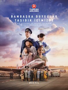 the movie poster for turkish airlines shows people standing in front of an airplane with their arms around each other