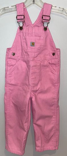 "Labeled 2T / color pink / measures side snap waist 11 1/2\" / inseam 12\" / length (shoulder straps fully extended to bottom leg) 30\" / Smoke free environment / no issues (90)" Light Pink Overalls, Spring Pink Bib Front Overalls, Pink Overall Jumpsuit With Pockets, Pink Cotton Bib Front Overalls, Pink Shortalls With Pockets, Pink Cotton Overalls, Casual Pink Overall Shortalls, Casual Pink Shortalls, Pink Cotton Shortalls With Pockets