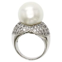 100% Authentic, 100% Customer Satisfaction Height: 15.5 mm Width: 4.5 mm Size: 6 ( Contact Us for Sizing) Metal:14K White Gold Hallmarks: 14K Total Weight: 16.6 Grams Stone Type: 15 mm South Sea Pearl & Approximately 1.10 CT Diamonds Color H-L Clarity SI-I Condition: New Estimated Price: $8500 Stock Number: JB-DR15 Luxury Pearl Ring With Single Cut Diamonds, Luxury Pearl Ring In Diamond White, Luxury Pearl White Ring With Diamond Accents, Luxury Pearl White Classic Diamond Ring, Luxury Sterling Silver Pearl Drop Ring, Luxury Diamond Pearl Ring, Luxury White Pearl Drop Ring, Luxury Pearl Ring With Diamond Accents In Diamond White, Luxury Pear-shaped Pearl Ring For Anniversary