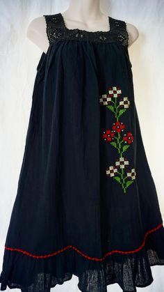 This is an Authentic Turkish hand sewed loose flowy women summer dress made with 100% cotton. Made from a special handmade garment in Turkey for over 150 years called "Sile Bezi".  + It's a short shoulder strap black dress with red and yellow Turkish flower motifs.  + For best fit please see below for fit measurements + Please note that the dress comes with special washing instructions. It's perfect for hot summer days. It's very light and airy. Can be dressed at the beach or casually during day Black Folk Style Beach Dress, Black Folk Style Summer Dress, Folk Style Cotton Floral Print Dress, Folk Style Cotton Dress With Floral Print, Black Floral Print Cotton Sundress, Black Cotton Sundress With Floral Print, Black Folk Style Cotton Dress, Black Cotton Folk Dress, Black Peasant Dress For Summer