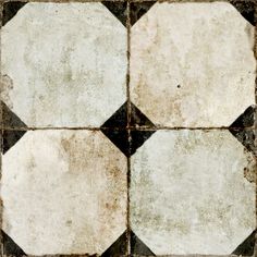 a black and white checkered tile floor with grungy paint on the edges