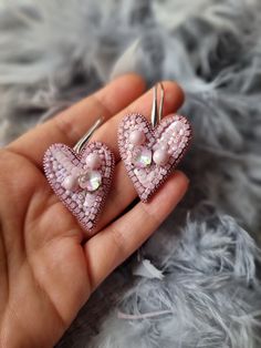 Elevate your style with these meticulously crafted pastel pink heart earrings, perfect for expressing love and appreciation. Each pair is thoughtfully handmade and comes beautifully packaged, making it an ideal gift for Mother's Day or any special occasion. 🎁✨ Embrace the artistry of unique beaded jewelry that speaks volumes without saying a word. Order now to add a touch of elegance to your or your loved one's collection! Pastel Pink Heart, Beaded Heart Earrings, Unique Beaded Jewelry, Word Order, Pink Heart Earrings, Beaded Heart, Artisan Earrings, Rose Pastel, Earrings Unique