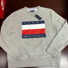 Tommy Hilfiger Mens Gray Long Sleeve Fleece Pullover Sweatshirt Size Large Brand: Tommy Hilfiger Department: Men Size: L Color: Gray Type: Sweatshirt Style: Pullover Pattern: Heather Theme: Classic Neckline: Mock Neck Season: Fall Winter Features: Comfort, Breathable Sleeve Length: Long Sleeves Condition: New With Tag I Offer Discounts For All Return Customers. - Jvs Winter Tommy Hilfiger Sweatshirt With Letter Print, Tommy Hilfiger Letter Print Winter Sweatshirt, Tommy Hilfiger Letter Print Sweatshirt For Winter, Tommy Hilfiger Sporty Letter Print Sweatshirt, Tommy Hilfiger Long Sleeve Streetwear Tops, Casual Tommy Hilfiger Cotton Sweater, Tommy Hilfiger Crew Neck Winter Sweatshirt, Tommy Hilfiger Cotton Crew Neck Sweater, Tommy Hilfiger Crew Neck Sweatshirt For Streetwear