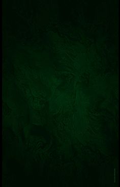 a dark green background with some black spots